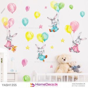 Flying Bunnies Wall Sticker with playful bunnies flying through clouds and stars, ideal for decorating children's rooms or nurseries.